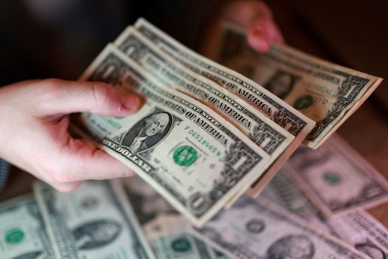 Dollar steady as traders await progress on Middle East peace talks