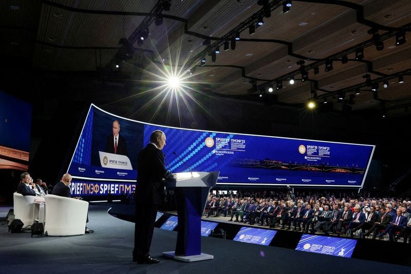 Putin’s ’Davos’ haunted by war and stagnation despite the swank of influencers