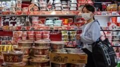 Japan raises interest rate to highest since 1995